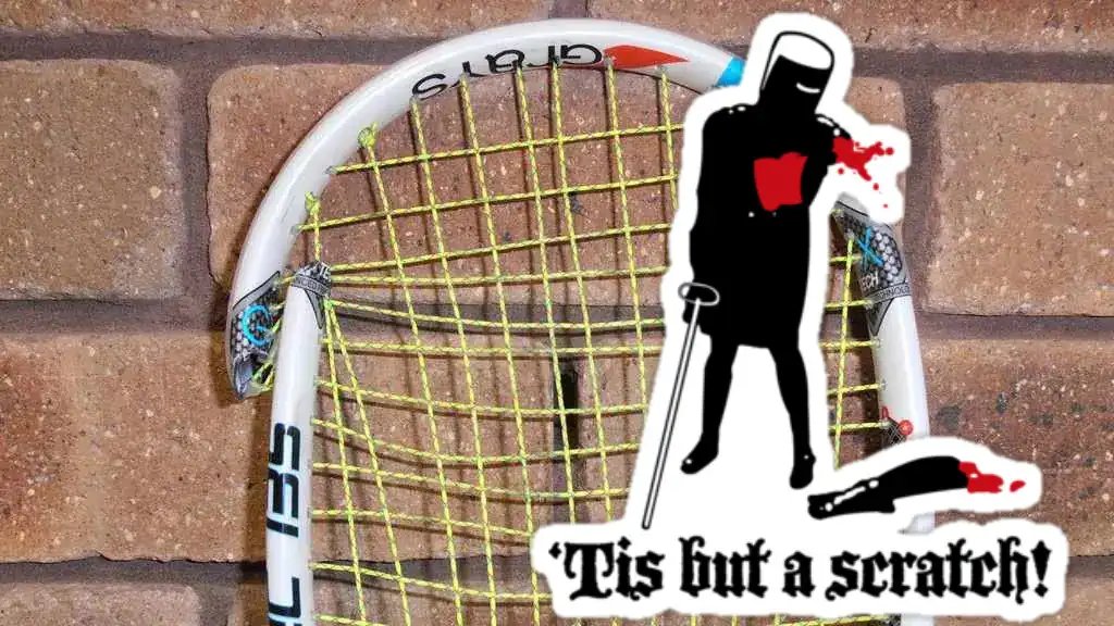 A very broken squash racket