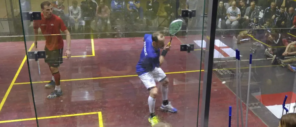 Gregory Gaultier, a professional squash player, hitting the ball