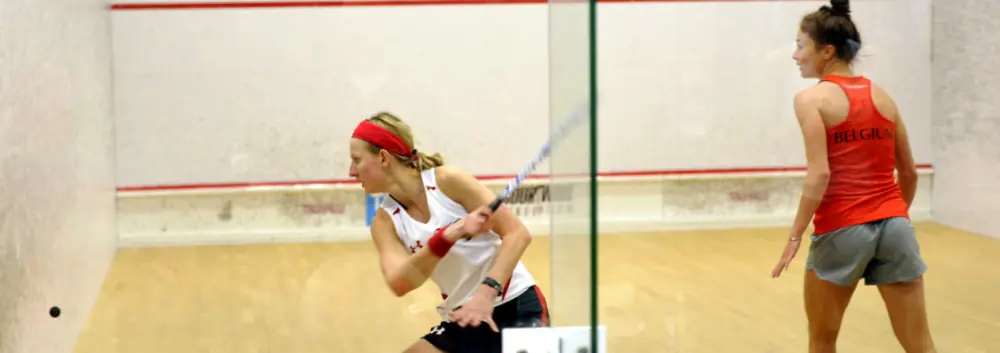 Alison Waters, a professional squash plaeyr, reaching for a shot