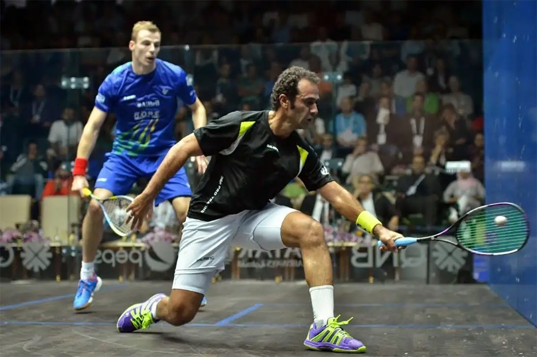 Amr Shabana watching the squash ball as he hits it