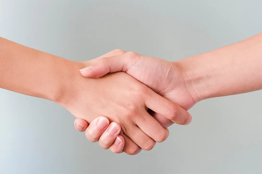 Two people shaking hands