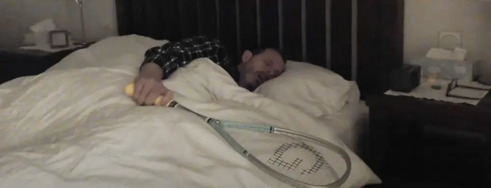 Sleep with a racket in your hand