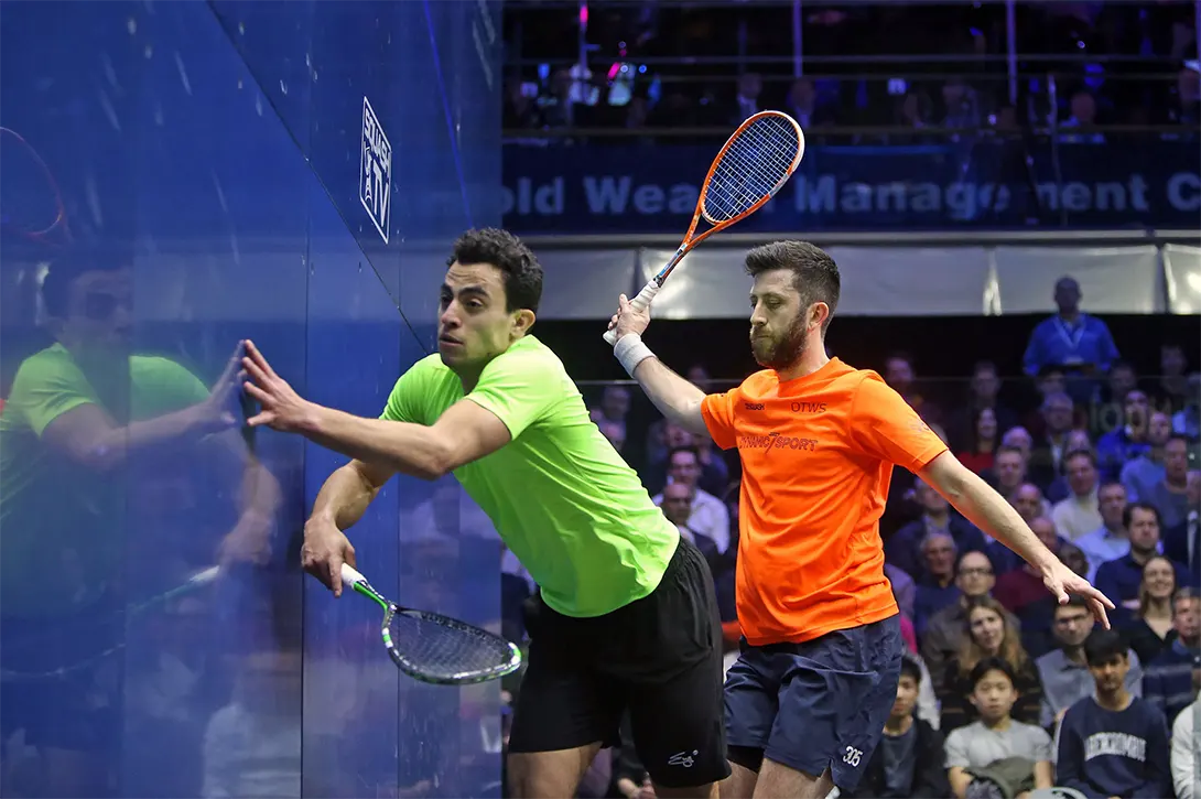 Two professionals squash players have a friendly meeting