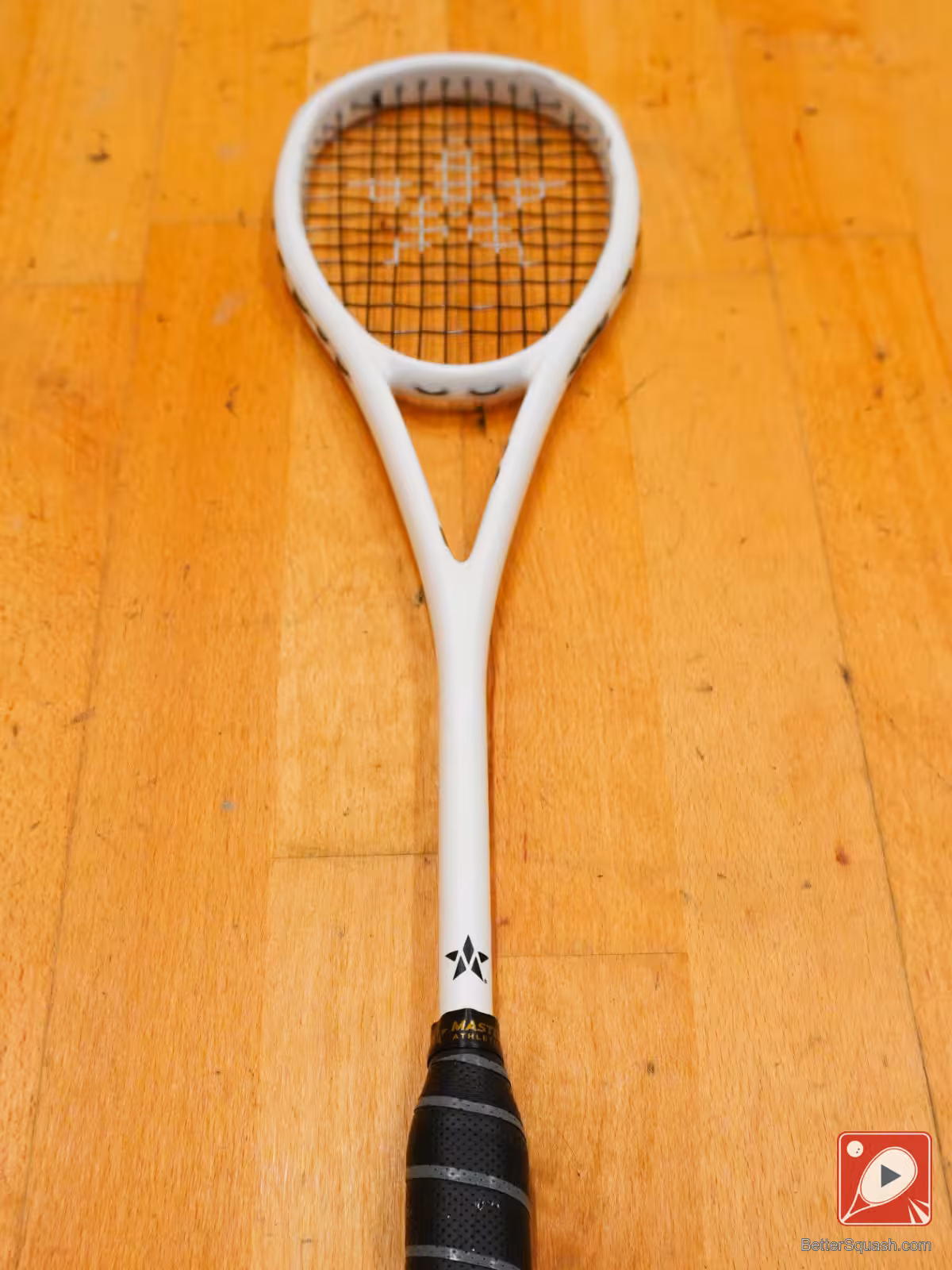 An almost full length view of the Master Athletics Squash Racquet