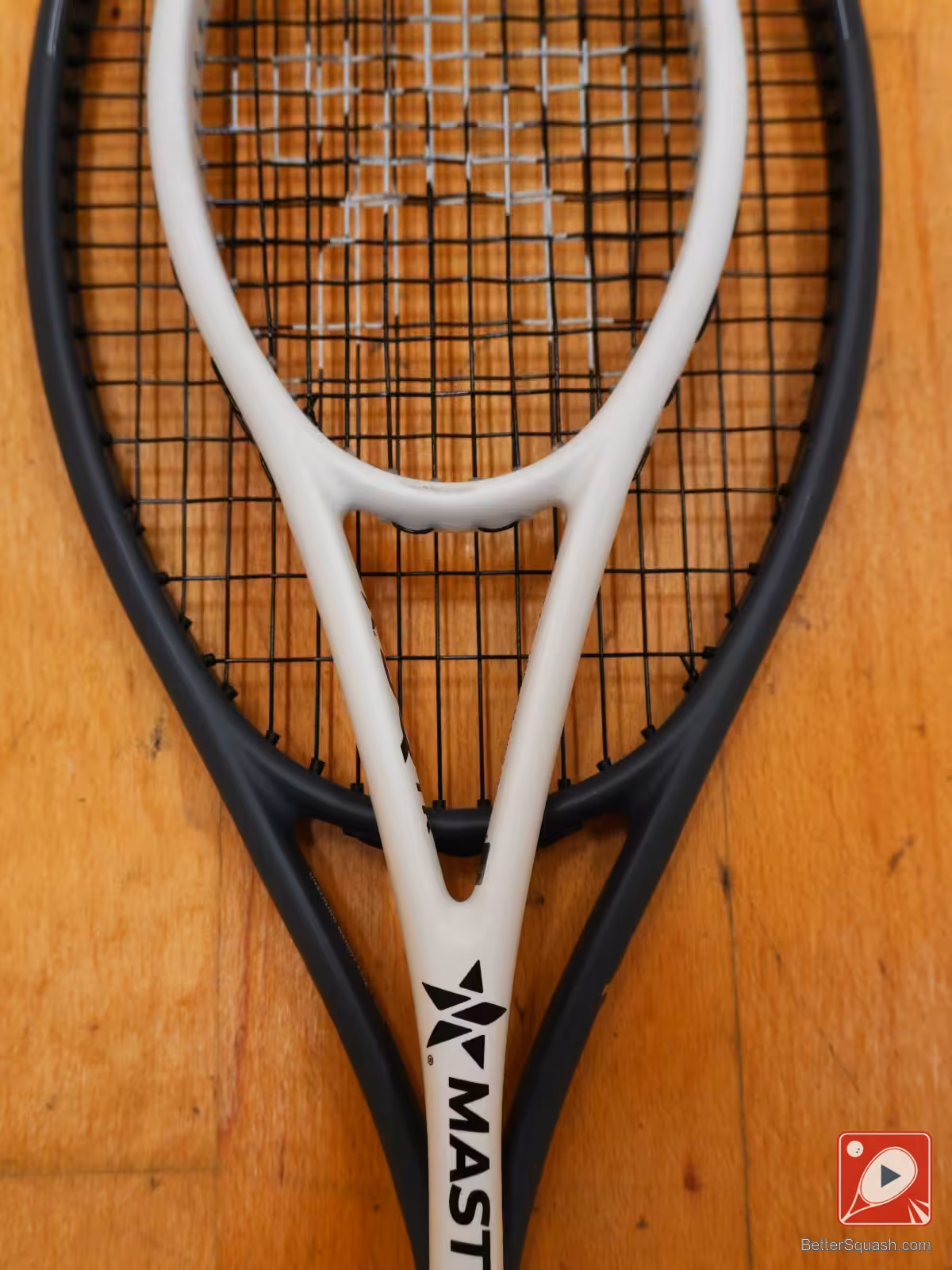 A throat area comaprsion between two Master Athletics Squash Racquets
